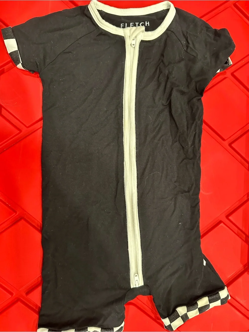 Fletch Black Short Sleeve Zip One-Piece Bodysuit for Kids